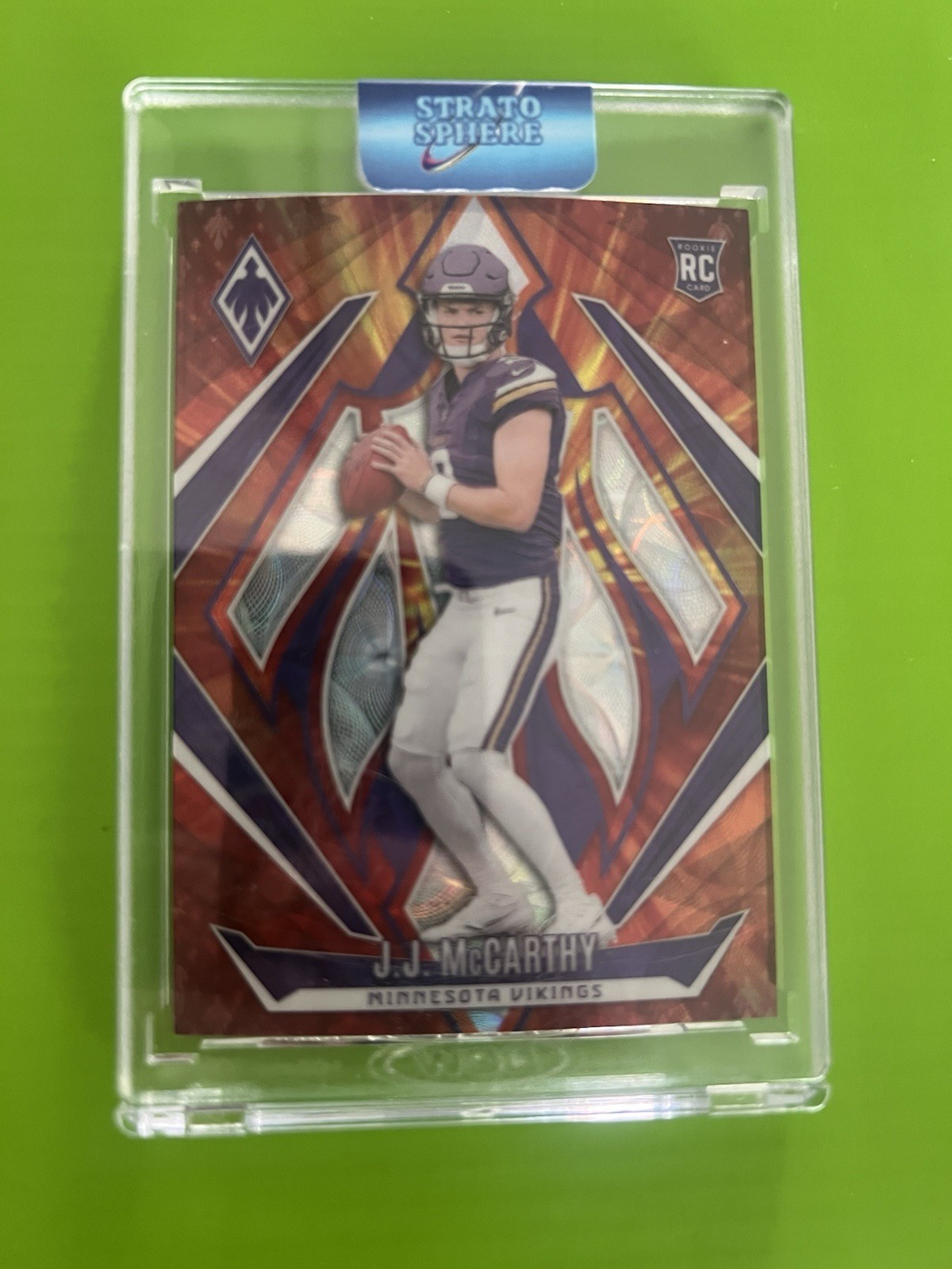 2024 Panini Phoenix - Rookies J.J. McCarthy #185 Fire Burst /350 (RC)