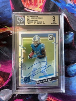2023 Panini Donruss Optic - Rated Rookie Jahmyr Gibbs #236 Holo Auto /75 - BGS 9