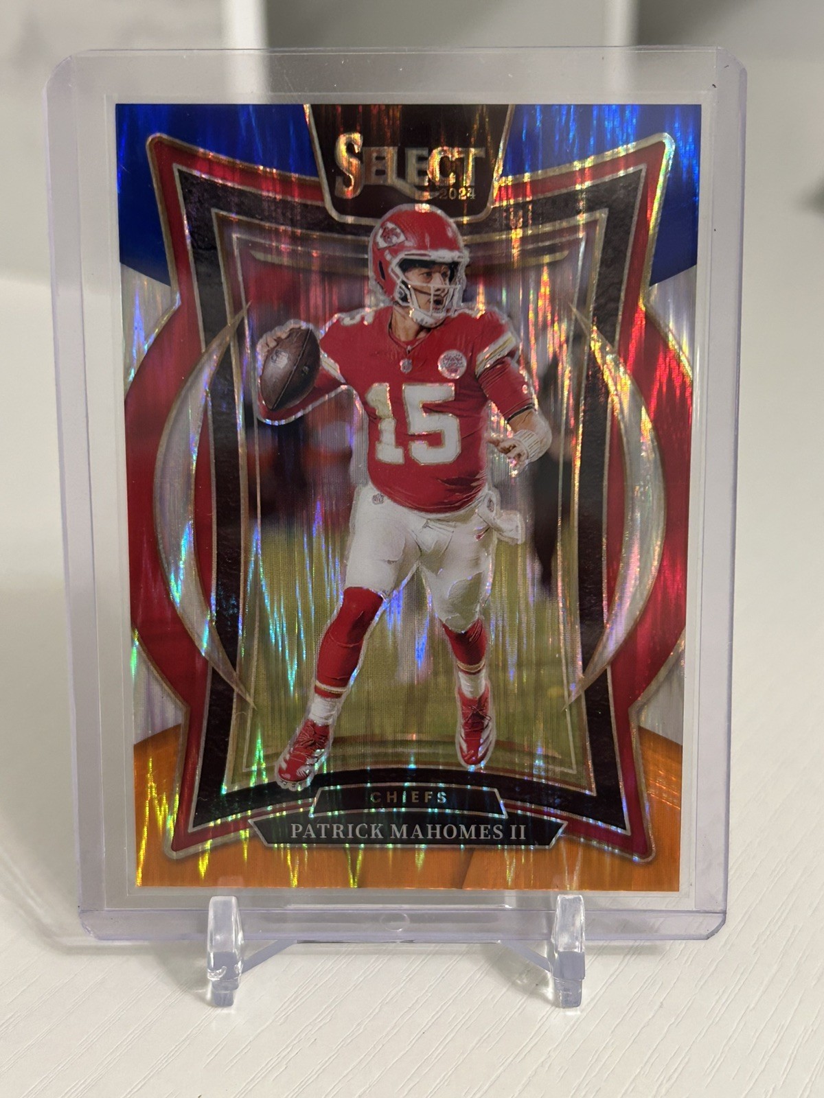 2024 Panini Select Concourse Patrick Mahomes II #33 Blue Orange Shock Prizm /35