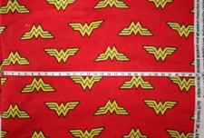 NEW Fleece fabric by the yard - Wonder Woman Logo on Red Background 58 inches W