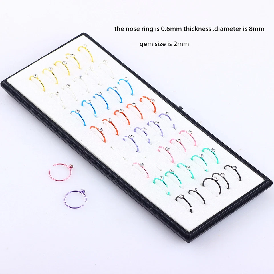 14-60 PIEZAS Anillo de pasador de nariz de acero quirúrgico pequeño pasador de hueso recto circonita cúbica perforación 20G Foto 2 de 3
