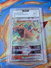 Carte Pokémon Dracaufeu VSTAR 018/172 E&B Stars Étincelantes PCA 9,5