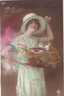 Old postcard fantasy April 1st woman with fish hat in net & daisies woman