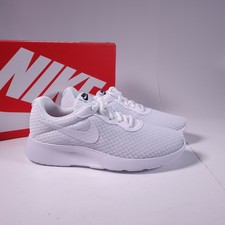 nike tanjun size 4