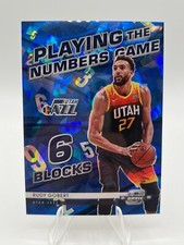2021-22 Contenders Optic Playing the Numbers Game Rudy Gobert #28 Blue Ice /75