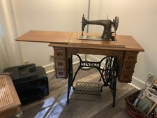 singer sewing machine  27-4 and caninet
