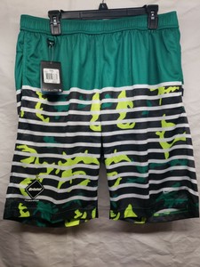 green nike soccer shorts