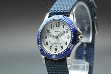 Montre Vintage Homme Seiko Alba V501-1C10 Lunette Bleue Cadran Argent...