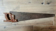 Disston U.S.A hand saw, wooden handle with weet carvings