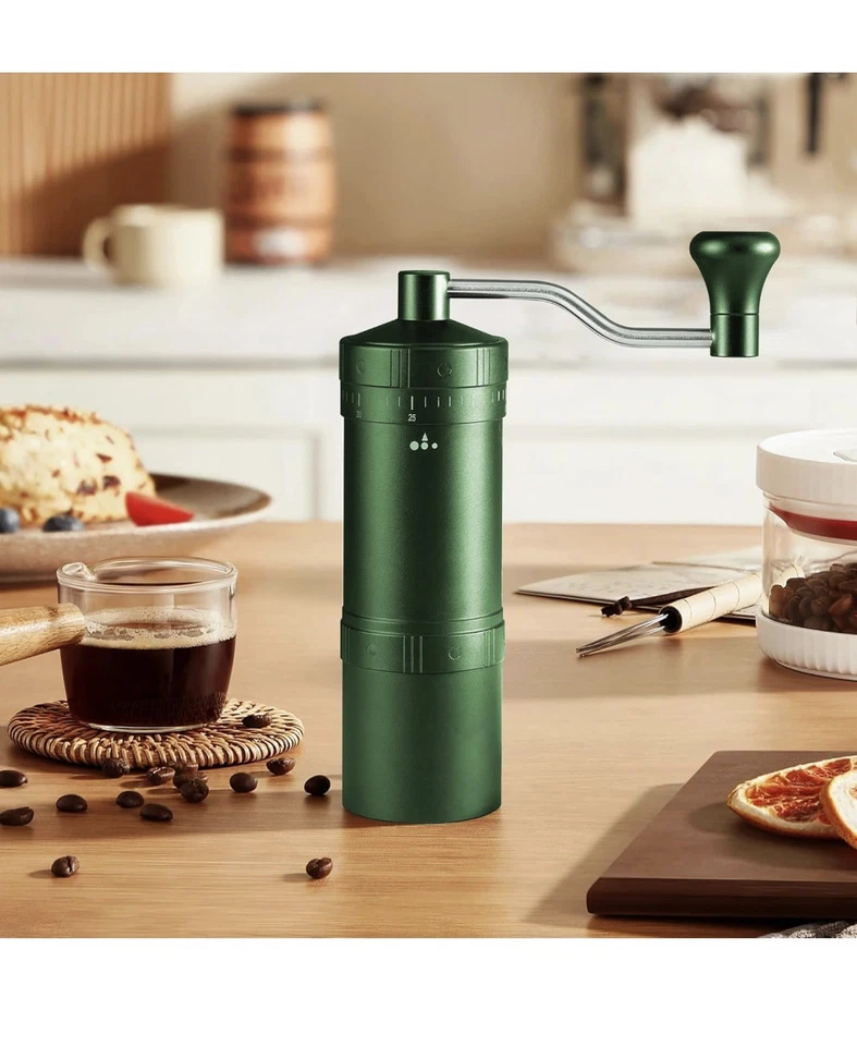 Molinillo de café manual de textura de acero inoxidable molinillo de café manual para el hogar Foto 2 de 4