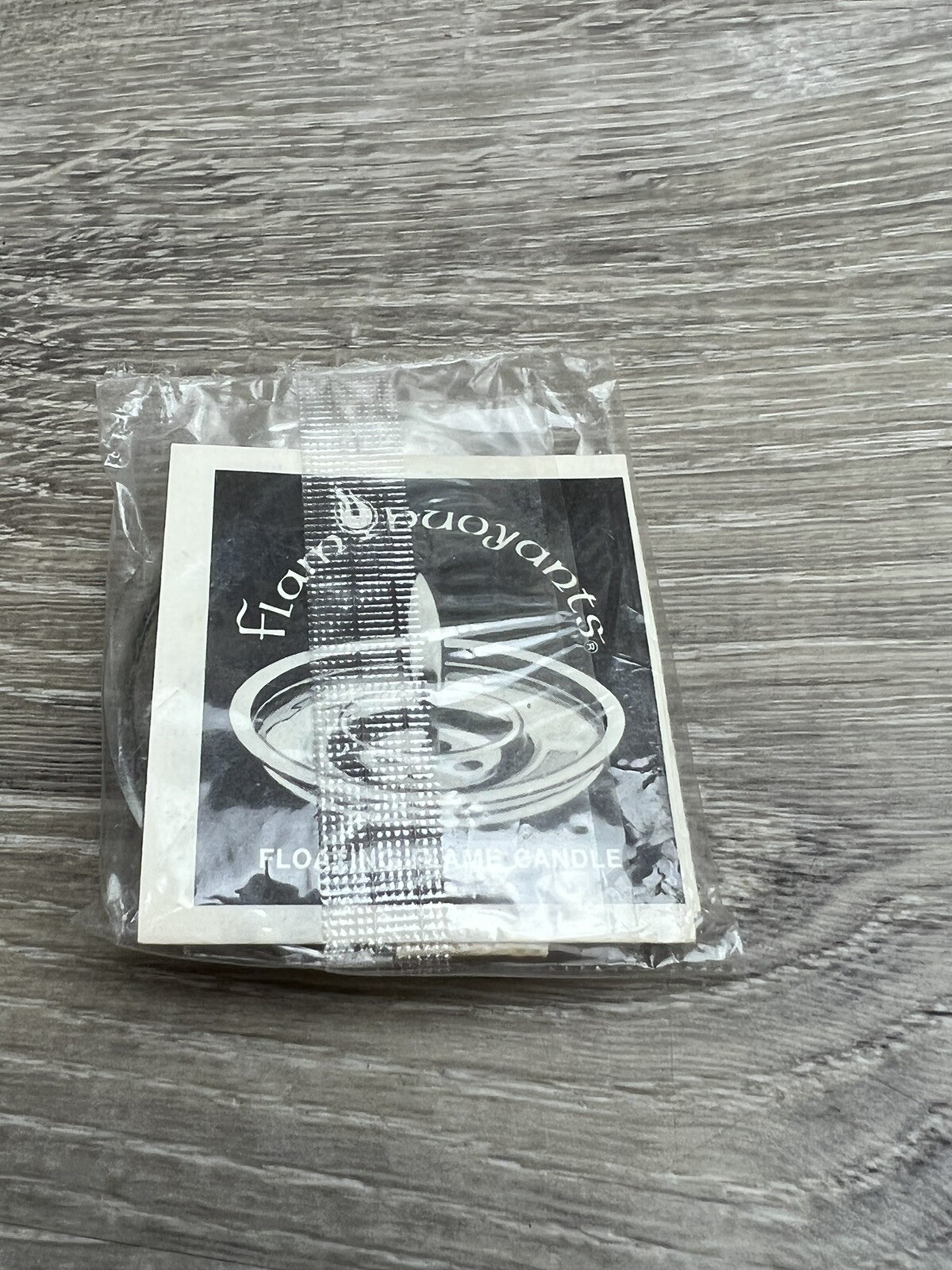 FLAMBUOYANT Enchanted floating flame Came & water candle, extra wicks Bin 13