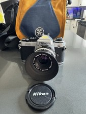 Nikon FE2 SLR 35MM Film Camera W Nikkor-H Auto 1:2 50mm Lens, Hood And Case