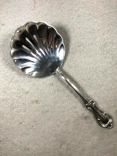International Silver "Joan Of Arc" Pierced Shell Sterling Bon Bon Spoon