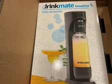 Omni Fizz water and juice fizzer, black. Never used, they shipped us two of them