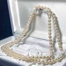Long doublestrand Akoya pearl necklace approximately 6570mm genuine pearls