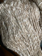 100 gm skein of a unique lace weight silk yarn 
