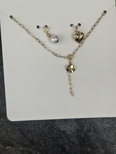 ￼ Halskette mit Herz-Charm & weißer Perle ...