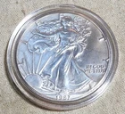 1987 DATED .999 FINE SILVER EAGLE DOLLAR BULLION COIN IN UNCIRCULATED CONDITION