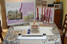 Un Built Dolls House and accesories