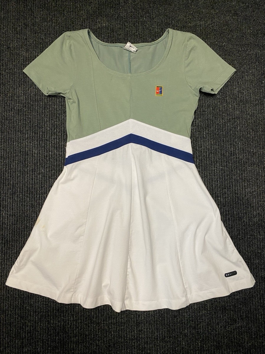 green emerald velvet dress FP Movement Baseline Tennis Dress for Women in Green Glow Combo main image 0