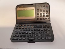 Sharp Electronic Organizer, MODEL Y0-370, 128KB, Used Needs Batteries