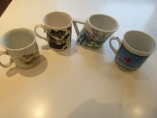 4 diverse Kaffeebecher (Porzellan)