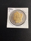 1884 O Morgansiver Dollar With Gold Gilding