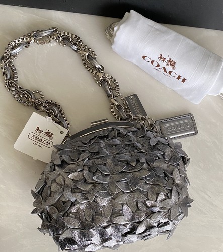 coach bag with leather flowers