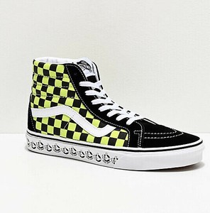 black and neon green vans