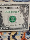 2013 Washington Dollar Repeater Banknote Serial # L52005200A — photo 1