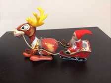 Vintage Japan made Tin Toy Santa Claus and Reindeer Pulling His Sleigh Wind-Up