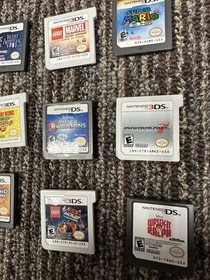 Nintendo 3DS Black, Charger, Car Charger, Stylus, And 12 Games.
