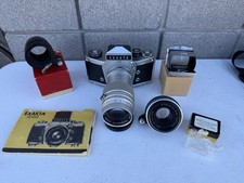 VINTAGE EXAKTA VX 1000 35mm CAMERA WITH 135mm LENS PLUS EXTRAS