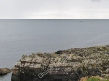 Photo 6x4 Water Rock Reef in Killough Bay Killough/J5436 The reef which  c2011