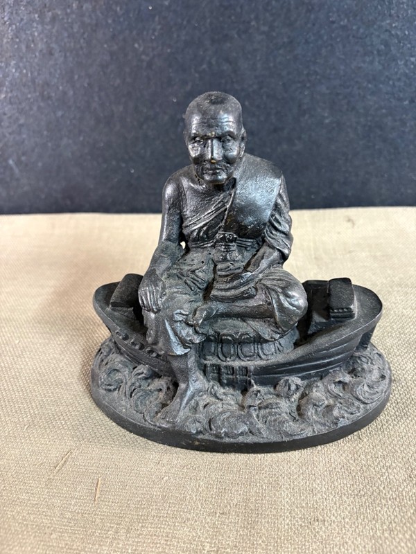 Luang Pu Thuat sitting in a boat figurine 6" x 7" Metal black finish cast style