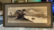 Vintage Japanese ink wash painting of Mount Fuji with gold accents.