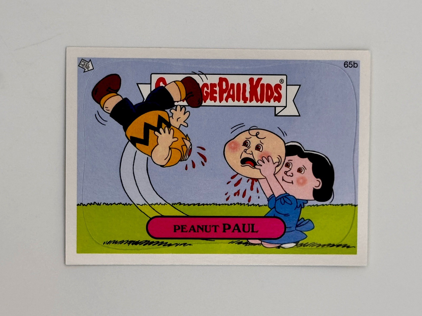 2013 Topps Garbage Pail Kids #65b PEANUT PAUL Brand-New Series 2 -Peanuts Parody