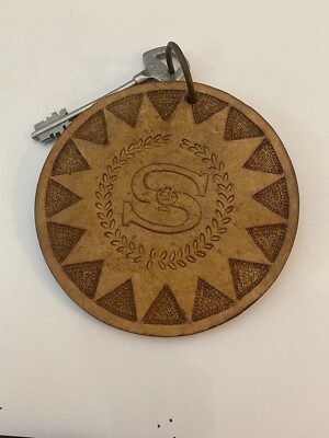 Vintage Sheraton LEATHER Sunburst Design Hotel Key #912  Unusual Key