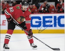 Autographed Chicago Blackhawks Caleb Jones 8x10 Photo Original