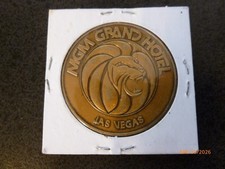 DATED 1973 MGM GRAND CASINO LAS VEGAS, NEVADA BRONZE COLORED TOKEN