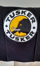 Tusker Beer t-shirt 💙  size LARGE New Black. Kenya HARIASTAMP Baada ya kazi..