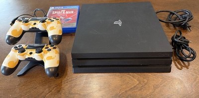 ps4 pro console 1tb , 2 controllers w Charger,Cords and 3 games P31