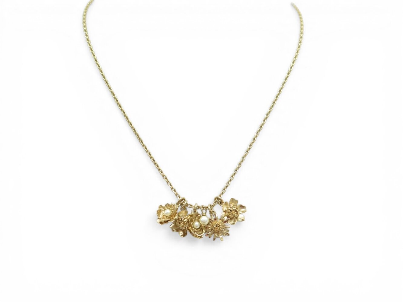 Collier Dior pendentif breloques fleurs, le cadeau idéal en métal doré