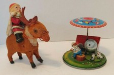 Two Different Japan Wind Up 1950's Toys