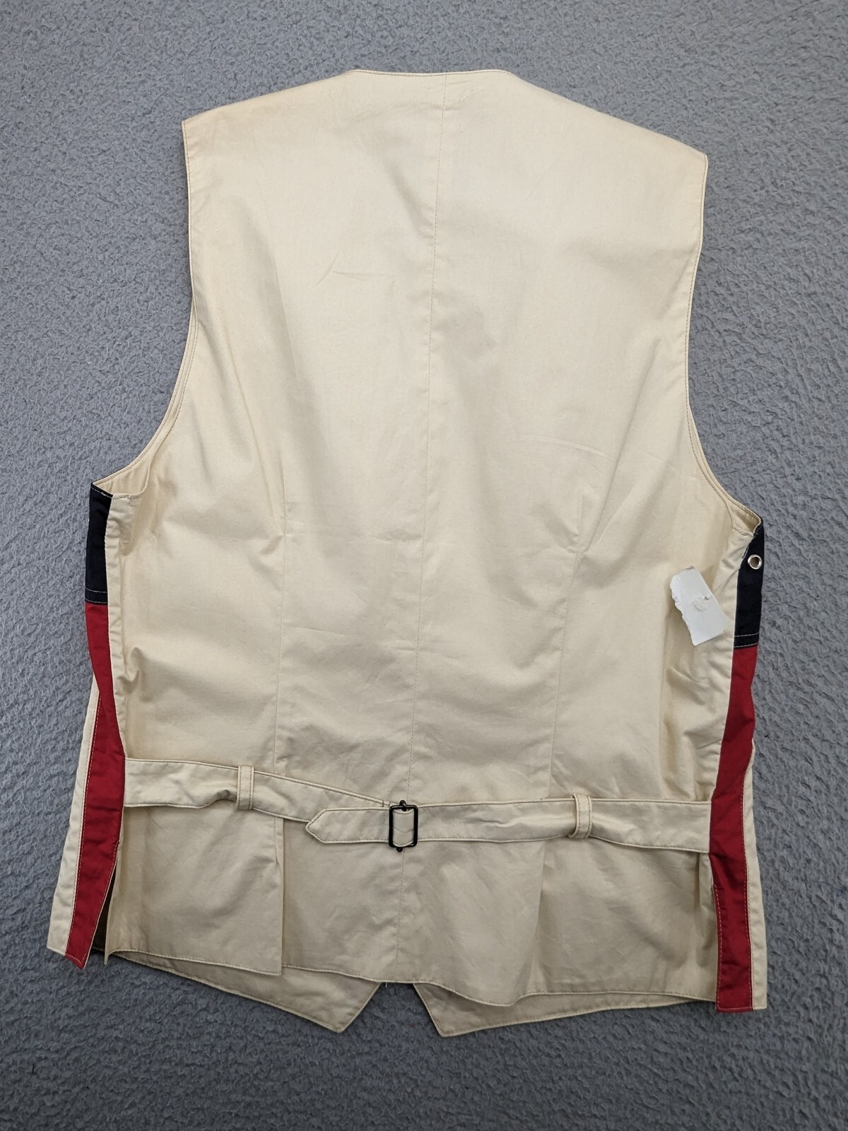 Beige Faconnable vest women’s medium with navy, red, and cream sides, black trim, and two-button front closure.