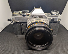 Canon AE-1 Silver Vintage SLR Film Camera w/ Canon FD 50mm f/1.8 Lens