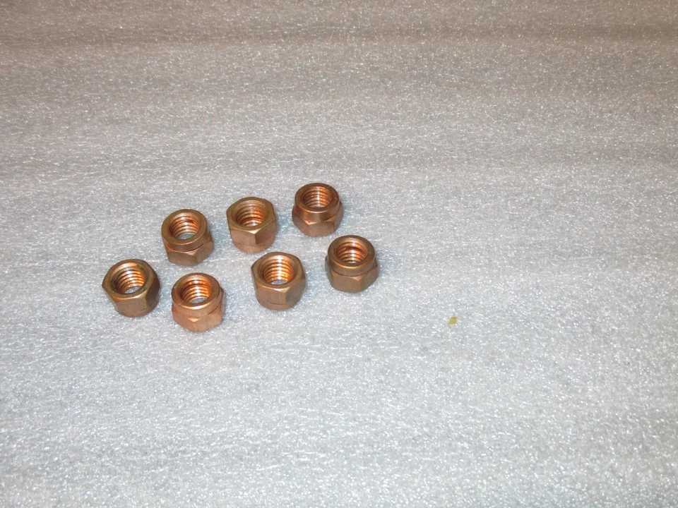 PORCA DE ESCAPE DE COBRE OD 14mm, ID 10mm PESSO DE ROSCA 1,5 mm - Imagem 2 de 3