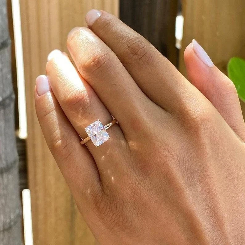 Radiant cut hotsell moissanite engagement ring
