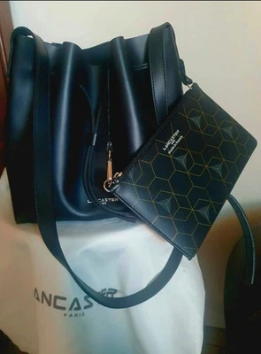 Lancaster Sac seau noir bandoulière cuir PU neuf avec pochon - Photo 1/4