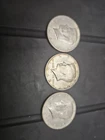 Three 40 percent silver kennedy half dollars. Two 1968D And One 1967.